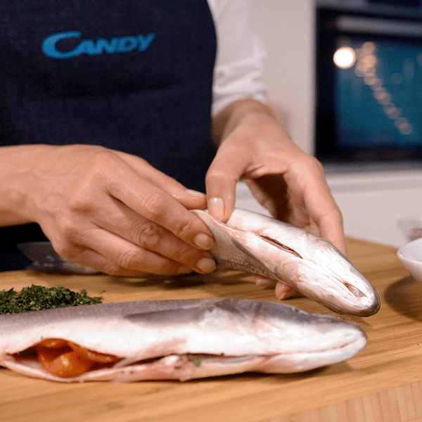 Oven-baked sea bass with cherry tomatoes and capers